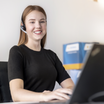 HERMA employee on the phone