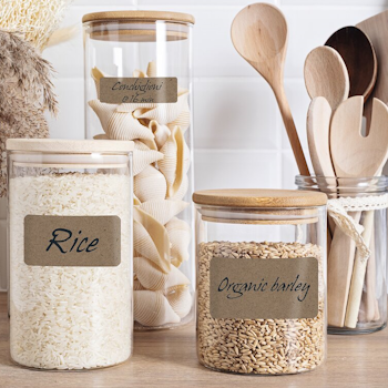 Storage jars with handwritten natural brown labels.