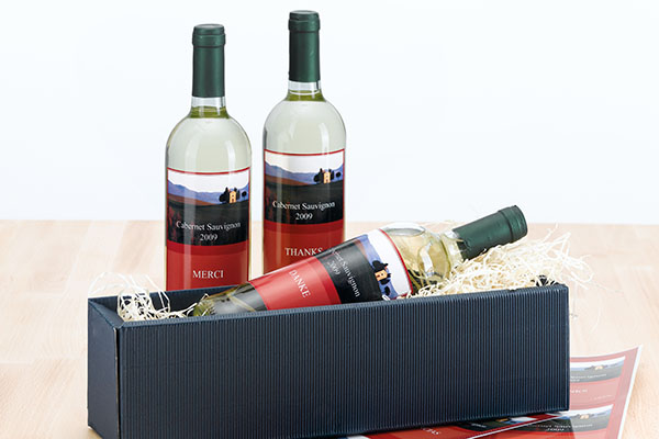 Labeled bottle labels on wine bottles.