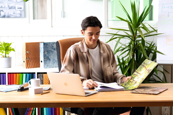 Person and folder at a desk