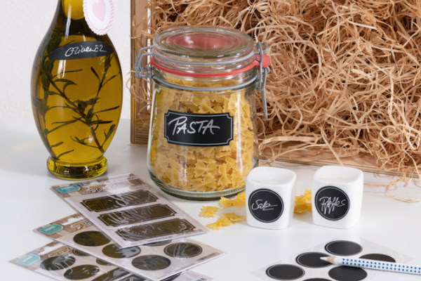 Storage jars and cups with chalkboard labels