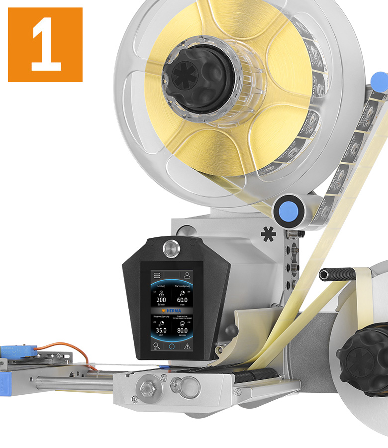 A machine with a large spool, a digital control display, and a mechanical arm for processing materials.