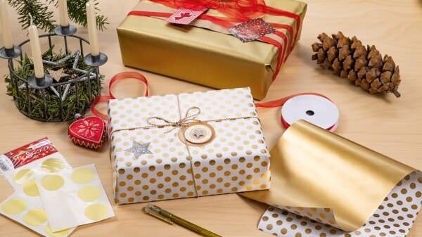 Various gift stickers on Christmas gift packages.