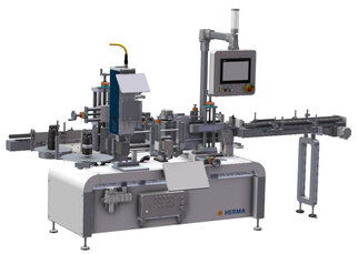 Automatic labelling machine with multiple stations, equipped with a control panel and various mechanical components for labelling.