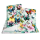 Colorful butterflies and flowers on a notebook cover displayed in an open position.