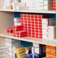 Pharmaceutical packaging on the shelves in the pharmacy.