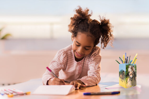 Girl at the desk with a HERMA pencil holder