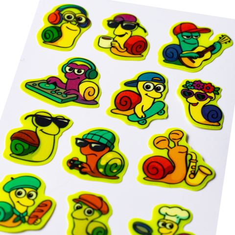 Colorful stickers of snails engaged in various activities, including listening to music, playing, and cooking, wearing sunglasses and hats.