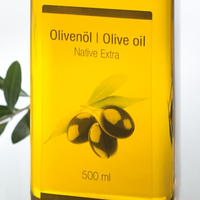 Bottle labeled with a transparent, printed label.