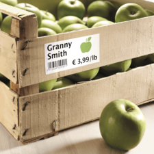 Kiste mit grünen Granny Smith Äpfeln, Preisschild zeigt € 3,99 pro Pfund.
