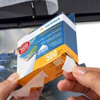 Take the photo corners out of the packaging.