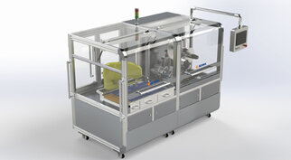 Automated machine with transparent walls, control unit, and work surface, suitable for industrial applications.