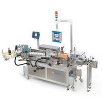 Automatic labelling machine with multiple stations, equipped with screens for controlling and monitoring the labelling process.