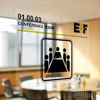 Transparent self-adhesive sign on conference room door