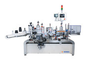 Automatic labelling machine with multiple stations, control unit, and safety indicators, suitable for various containers.