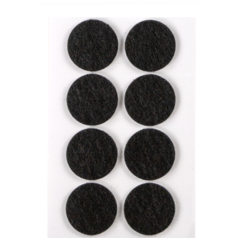 Acht runde, schwarze Filzgleiter auf einer weißen Trägerfolie, geeignet zum Schutz von Möbeln und Böden.