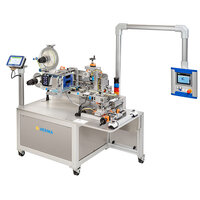 Automatic labelling machine with a control panel and various mechanical components for labelling products.