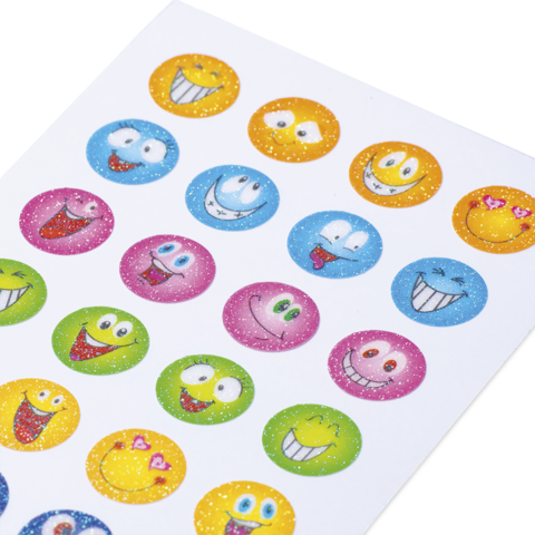 Bunte Aufkleber mit verschiedenen Emoji-Gesichtern in runden Formen, die Freude und verschiedene Emotionen darstellen.
