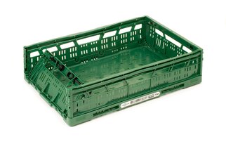 Green plastic crate with open sides and bottom, suitable for the storage and transport of food or other items.