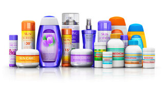 Various skincare and sunscreen products in different packaging and sizes, arranged against a white background. Focus on the product labels.
