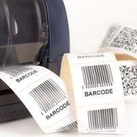 Roll labels with barcode printing at the printer.