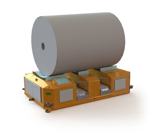 A bright orange transport cart with a large roll of paper on top, equipped with several controls and wheels.