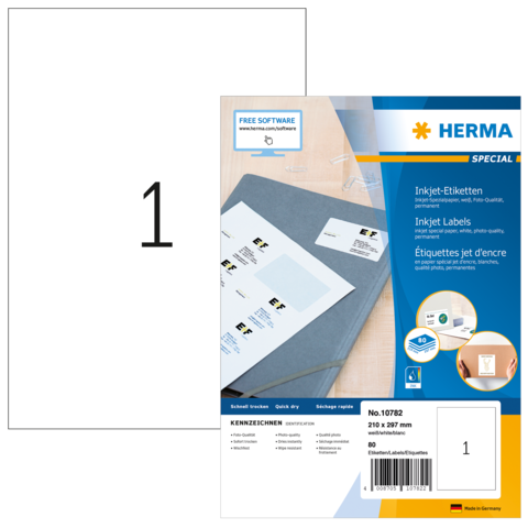 Weißes Blatt Papier neben einer Verpackung von HERMA Inkjet-Etiketten, die Informationen zu Größe und Anzahl der Etiketten enthält.