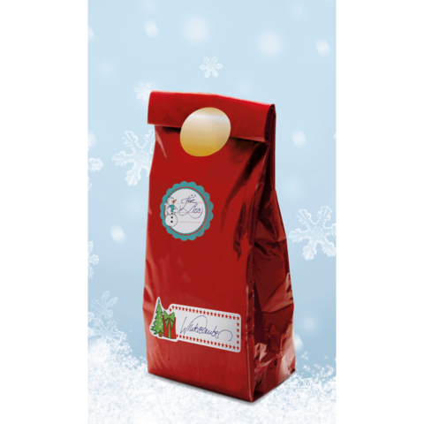 Rote Verpackung mit einem Schneemann-Label und der Aufschrift "Winterzauber". Hintergrund mit Schneeflocken auf blauem Grund.