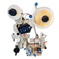 A labelling machine with two rollers, a control panel, and various mechanical components for the automatic labelling of products.
