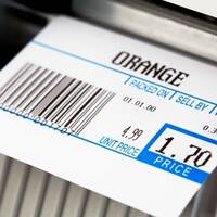 Printed thermal label for oranges, on a scale