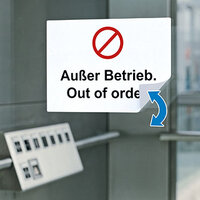 Label indicating out of service on glass door