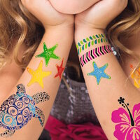 Children's arms adorned with many tattoos.