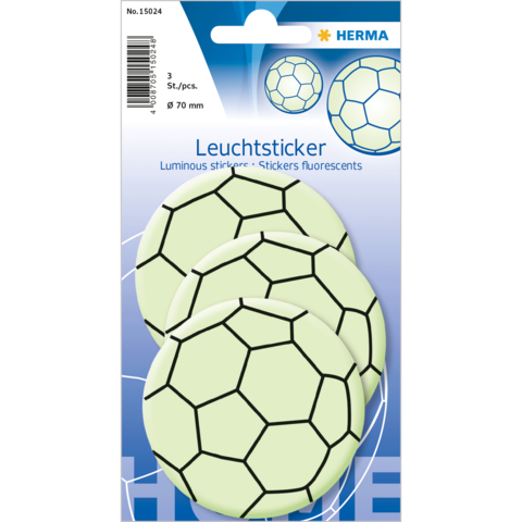 Drei leuchtende Sticker in Form von Fußbällen, verpackt auf einer blauen Karte. Jeder Sticker hat ein schwarzes Muster auf grünlichem Hintergrund.