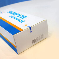 Packaging with the imprint 'TAMPER evident' and the HERMA logo, indicating tamper-proof security.