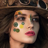 Woman with face art stickers on her face.